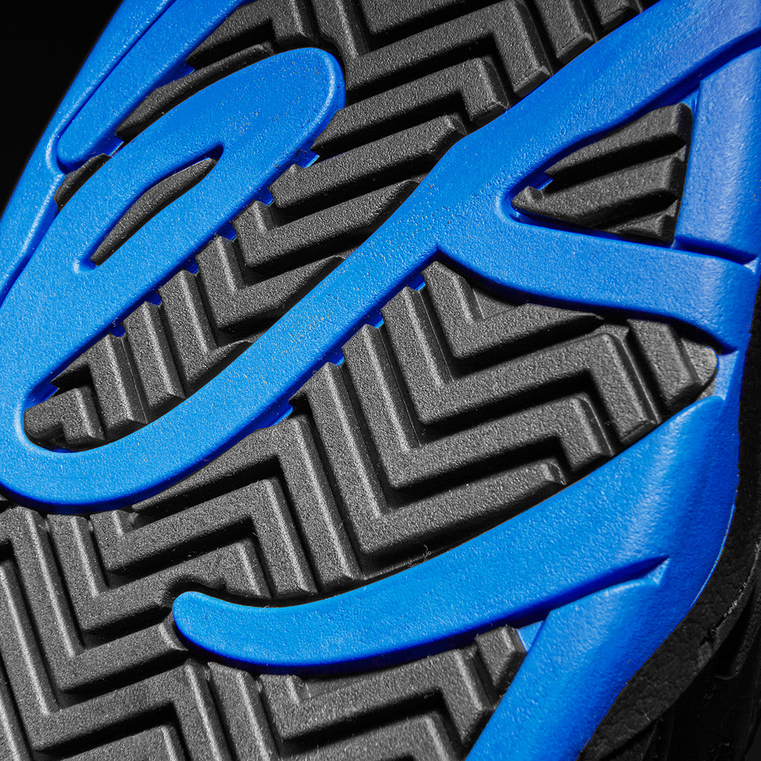 Close-up of éS Muska limited edition skate shoe sole with blue accents, showcasing unique pattern design.