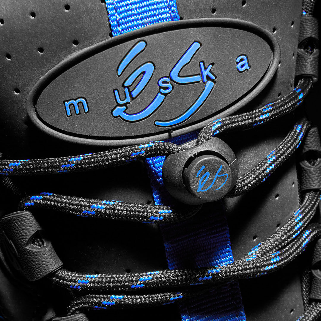 Close-up of iconic éS Muska limited collector's edition skate shoe design with blue and black laces.